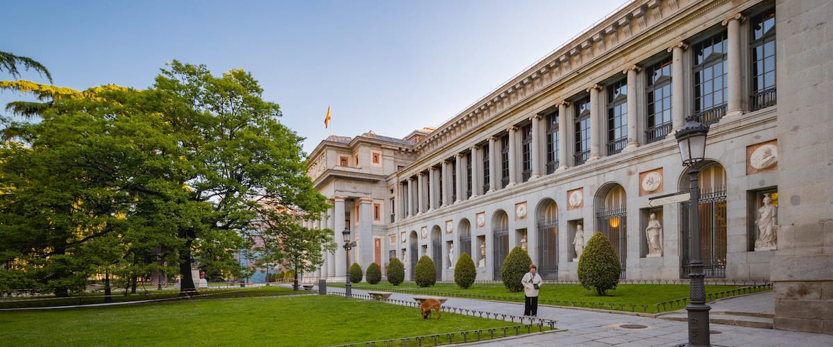 Prado Museum featuring a garden and heritage architecture