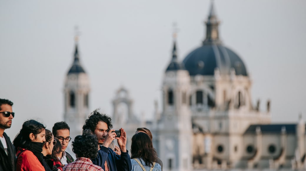 Almudena Cathedral as well as a small group of people