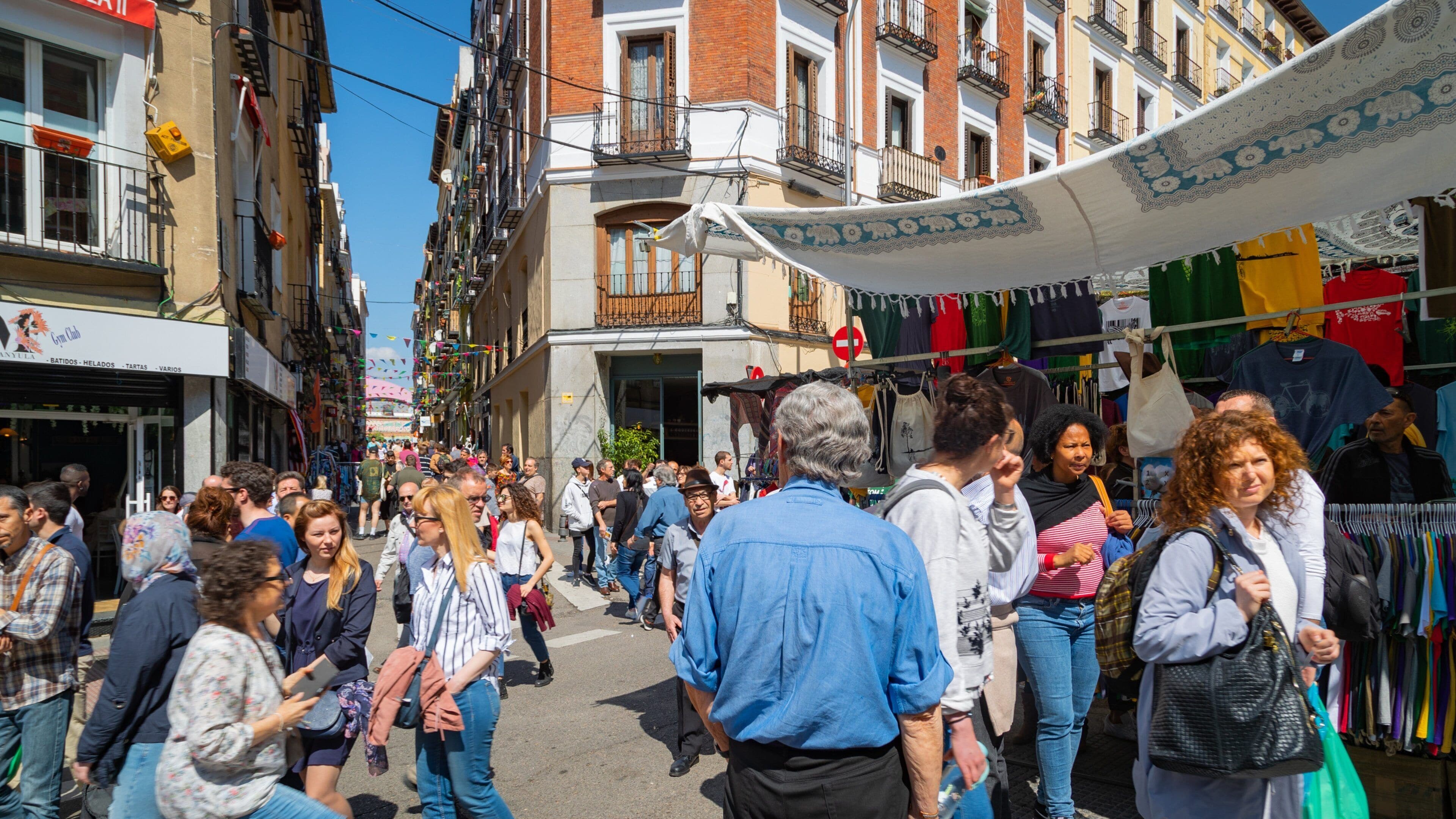 El Rastro which includes markets and street scenes as well as a small group of people