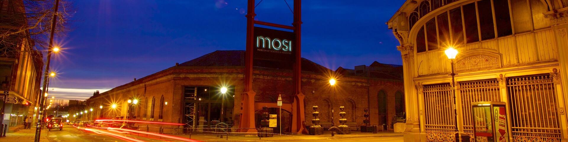 Museum of Science and Industry featuring a sunset, night scenes and a city