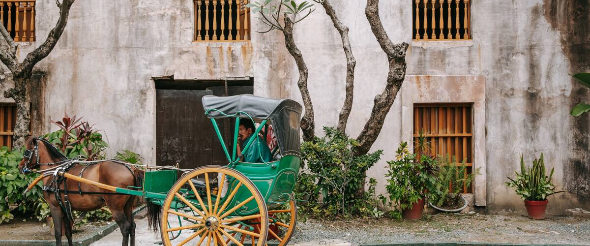 Fort Santiago featuring horseriding, land animals and heritage elements