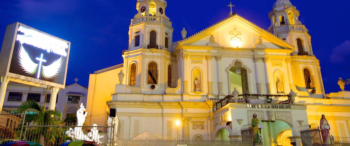 Iglesia de Quiapo ofreciendo aspectos religiosos, escenas nocturnas y una ciudad
