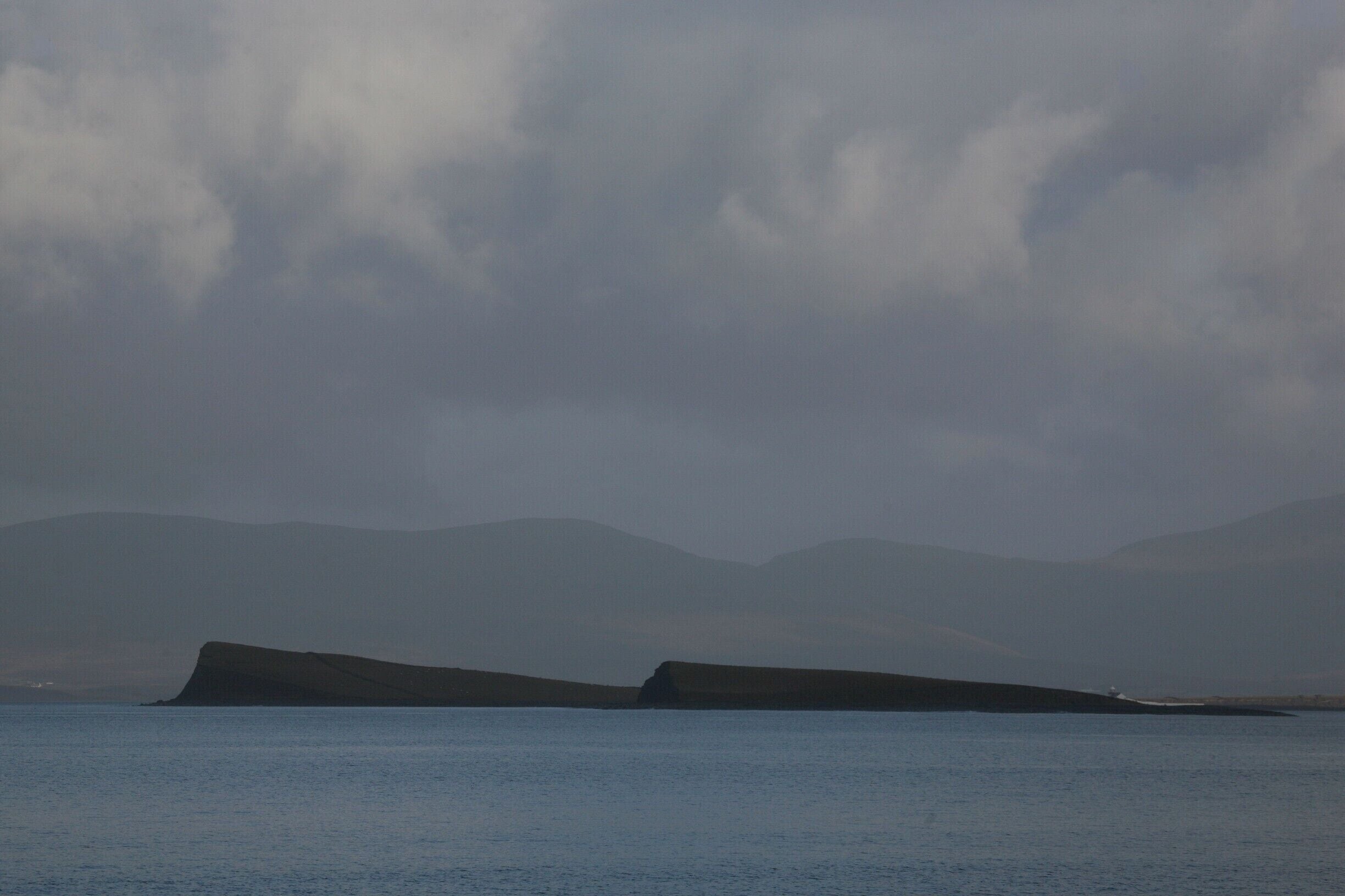 The west of Ireland is a magical place. The combination of stunning landscapes and every-changing light conditions means that places always look fresh and new. Here, in Clew Bay, the threatening sky creates a scene reminiscent of a Paul Henry painting #Blue