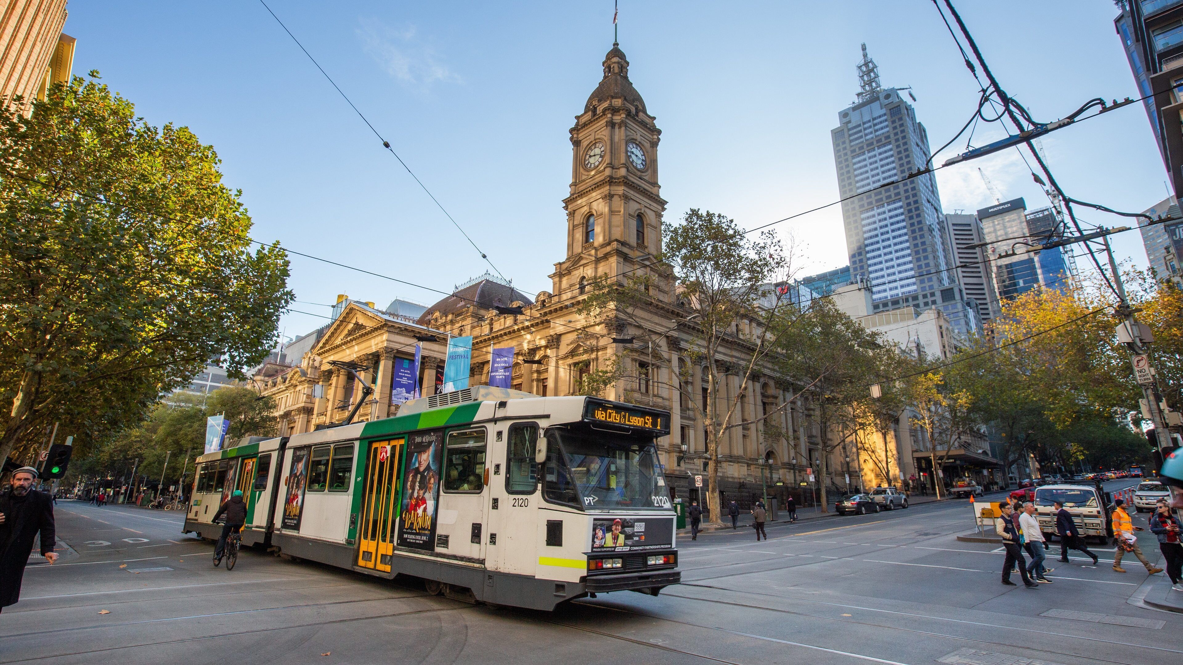 Melbourne Town Hall showing a city, railway items and heritage architecture