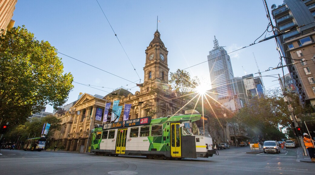 Melbourne Town Hall showing heritage architecture, a sunset and railway items