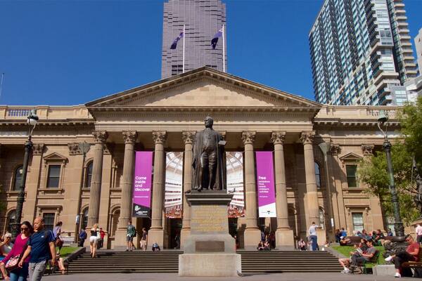 State Library of Victoria showing an administrative building, heritage architecture and a statue or sculpture