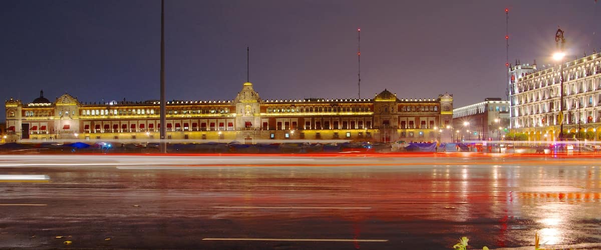 Palacio Nacional which includes chateau or palace, night scenes and a city