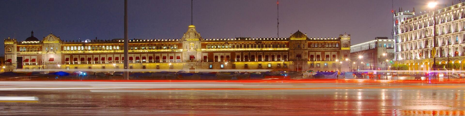 Palacio Nacional which includes chateau or palace, night scenes and a city