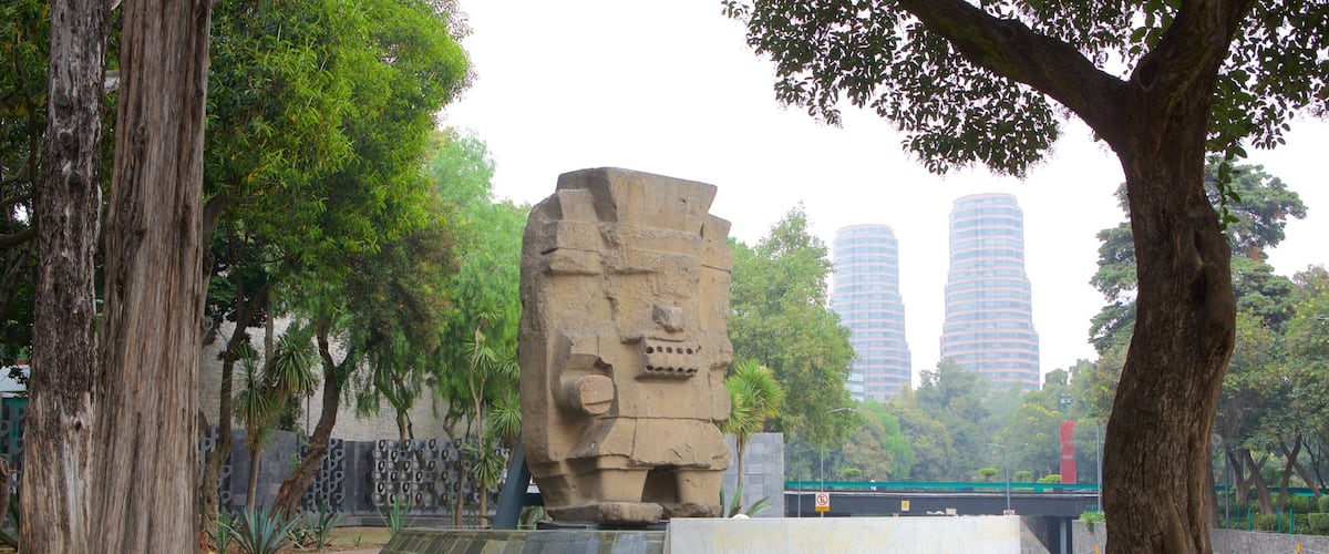 Museo Nacional de Antropologia which includes a statue or sculpture and a square or plaza