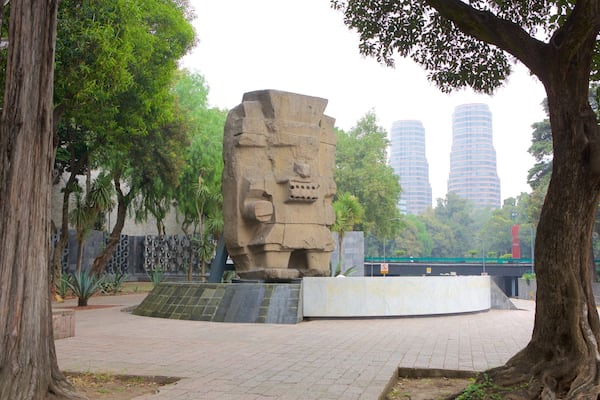 Museo Nacional de Antropologia which includes a statue or sculpture and a square or plaza
