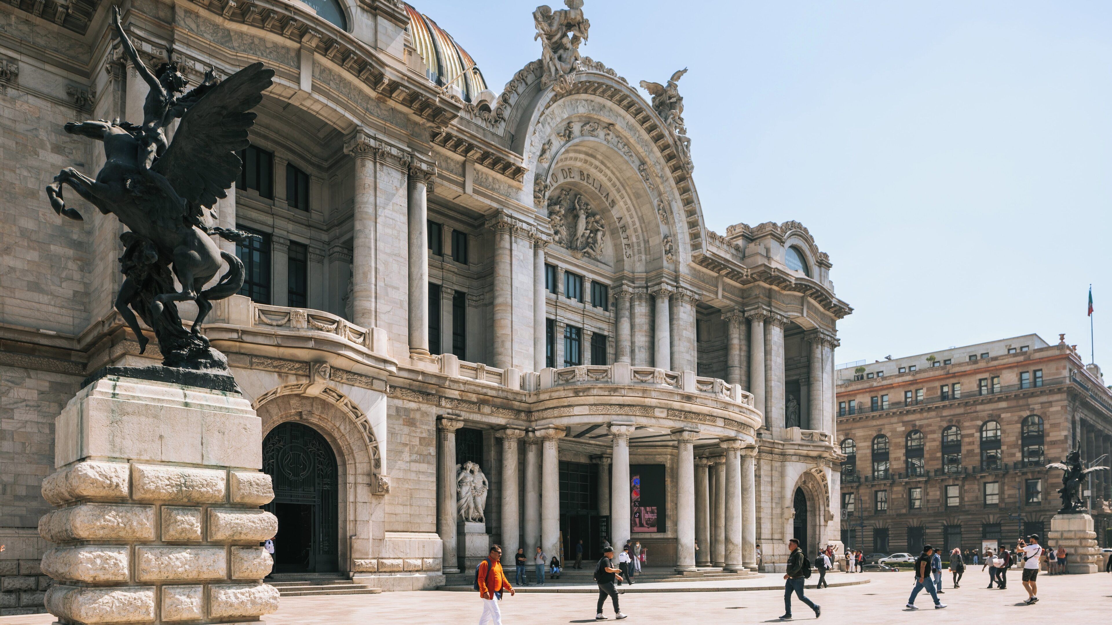 Palacio de Bellas Artes stands majestically in Cuauhtémoc, Mexico City showcasing its architectural beauty and cultural significance during a sunny day