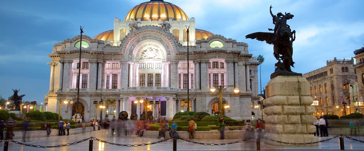 Palacio de Bellas Artes which includes heritage architecture, night scenes and a statue or sculpture