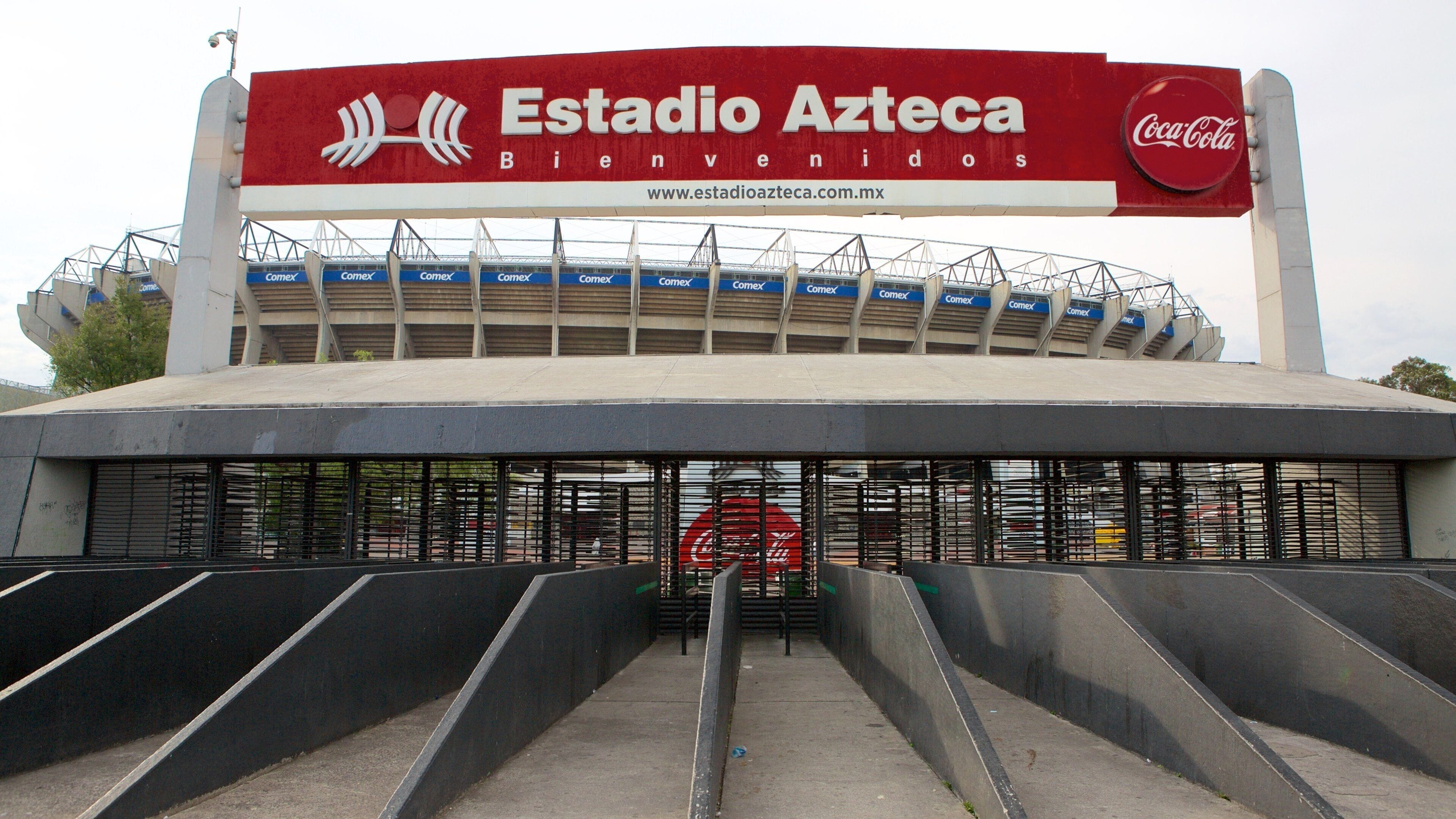 Estadio Azteca featuring a sporting event and signage