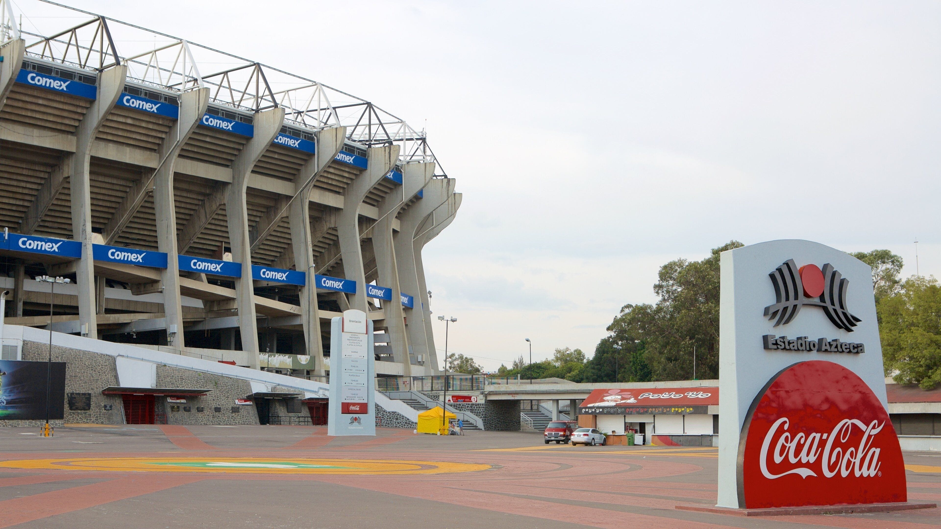 Estadio Azteca featuring signage and a sporting event