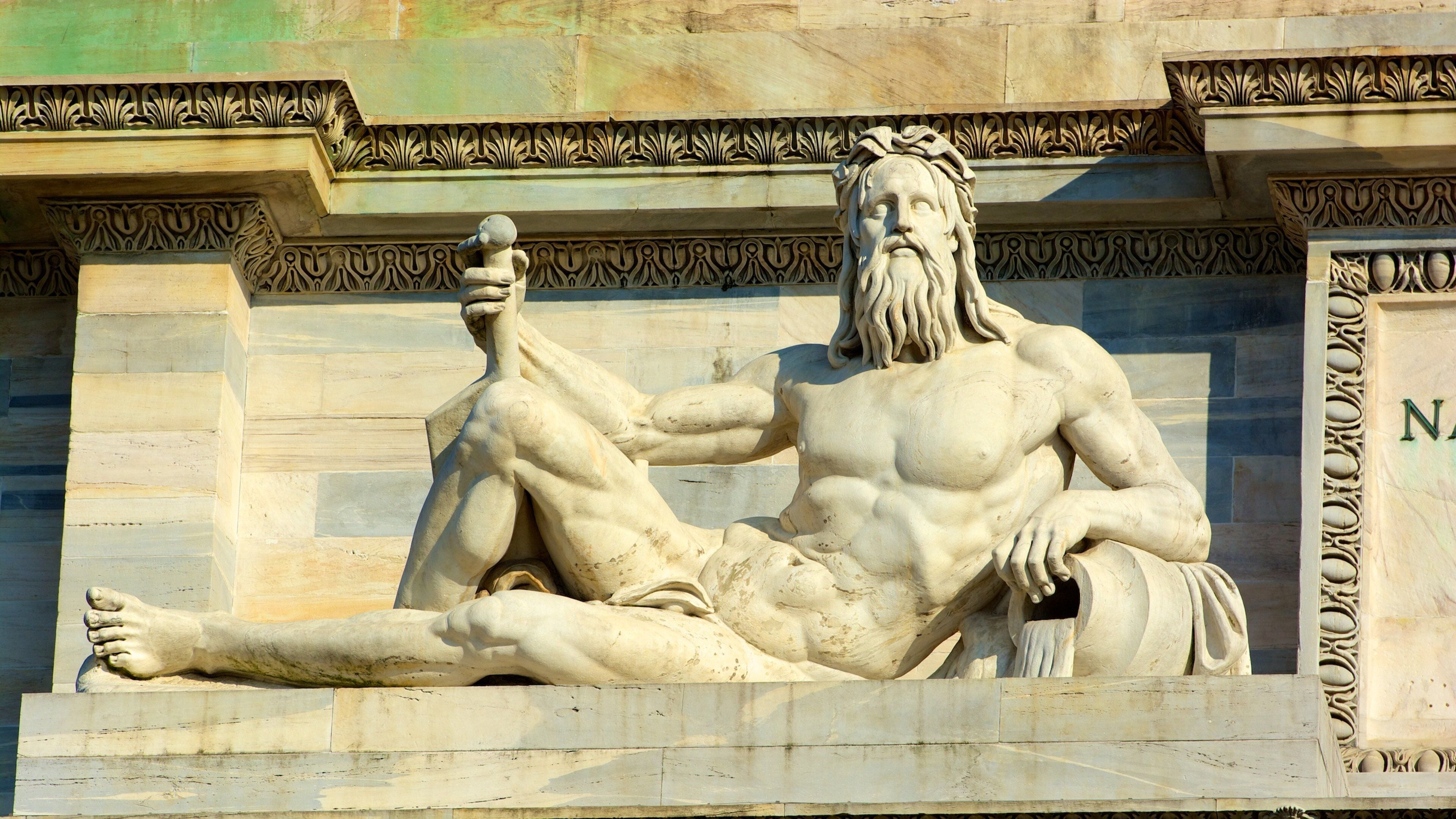 Arco della Pace featuring heritage elements and a statue or sculpture