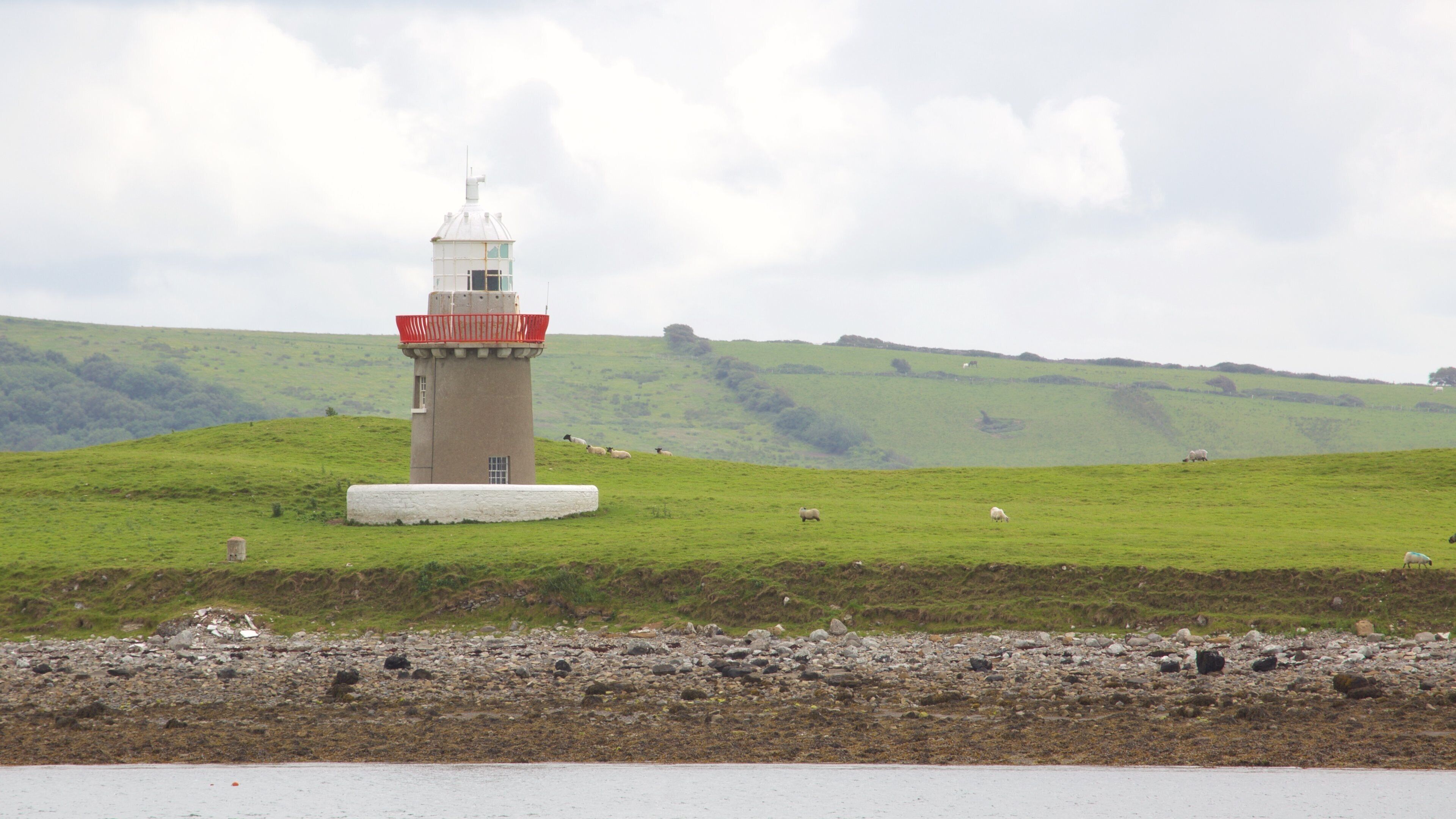 Rosses Point featuring tranquil scenes, a lighthouse and general coastal views