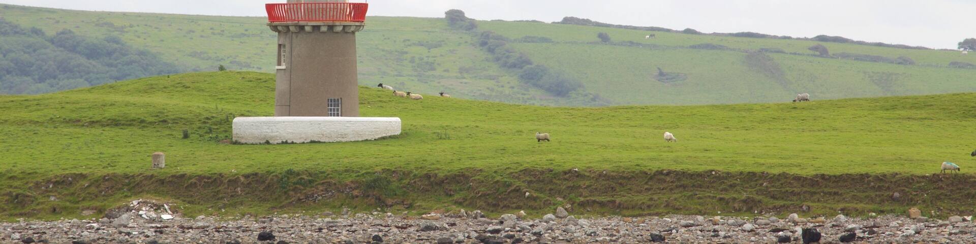Rosses Point featuring tranquil scenes, a lighthouse and general coastal views