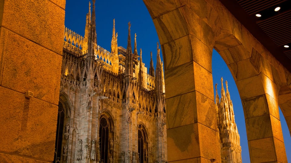 Cathedral of Milan showing night scenes, a church or cathedral and heritage architecture