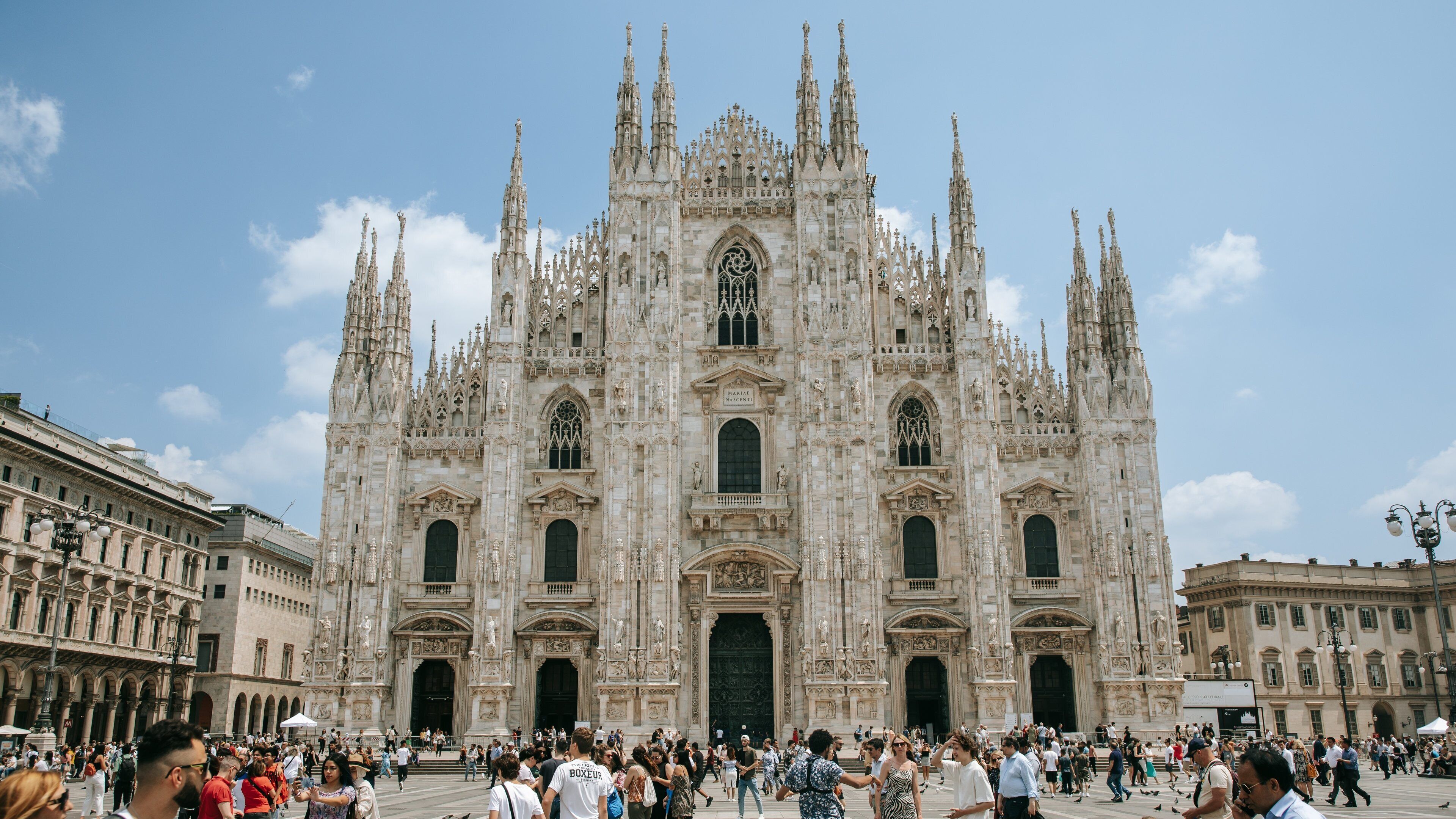 Cathedral of Milan featuring a church or cathedral, a square or plaza and heritage architecture