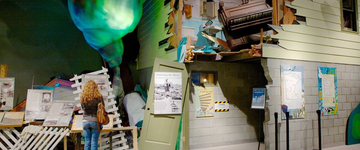 Minnesota History Center featuring interior views as well as an individual female