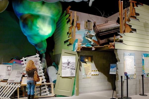 Minnesota History Center which includes interior views as well as an individual femail