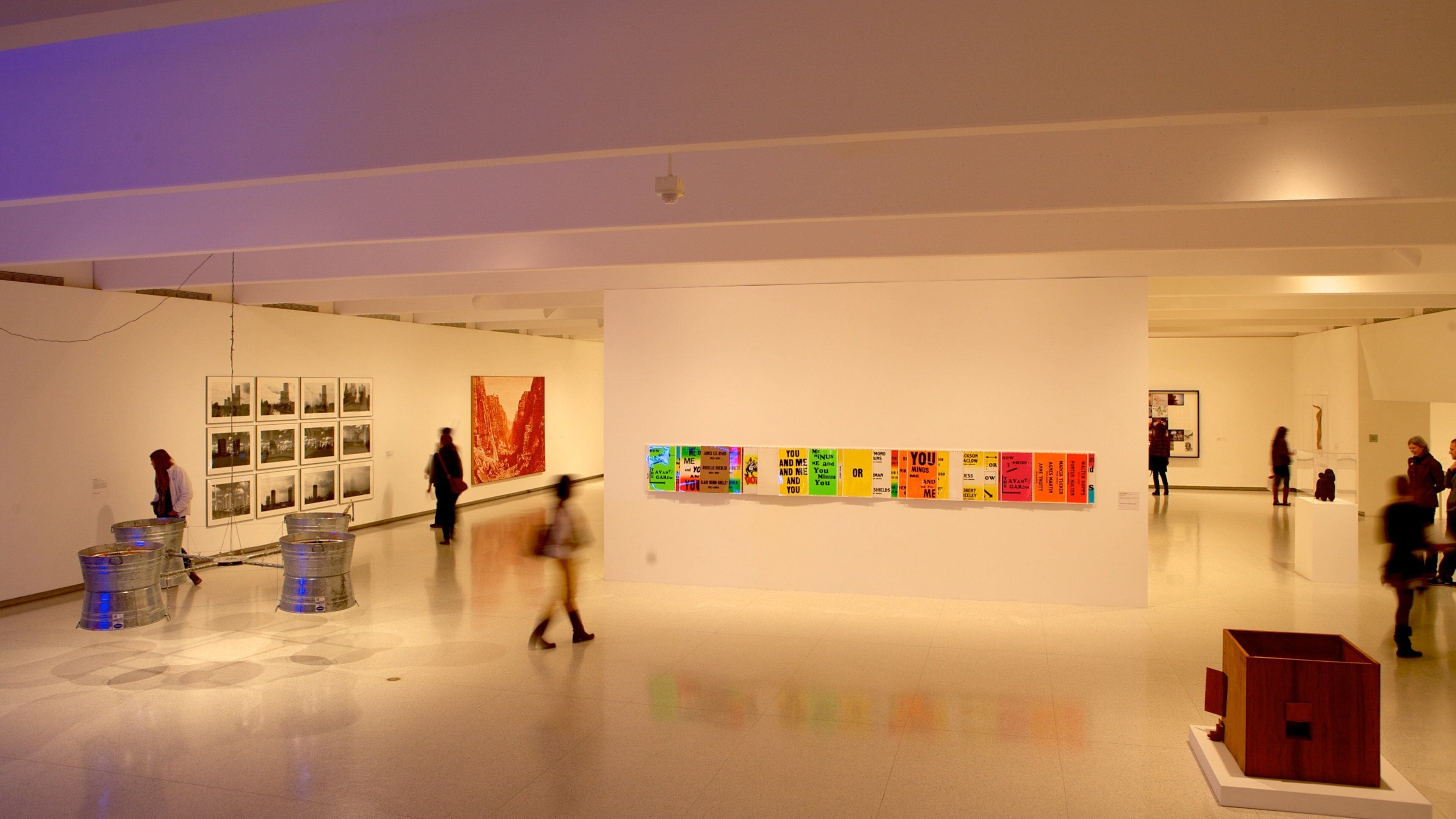 Walker Art Center showing interior views and art as well as a small group of people