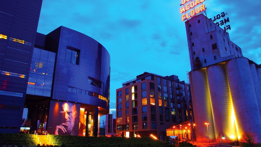 Guthrie Theater which includes theatre scenes, night scenes and a city
