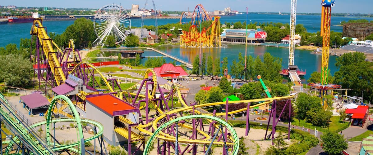 La Ronde Six Flags which includes a city, rides and a bay or harbor