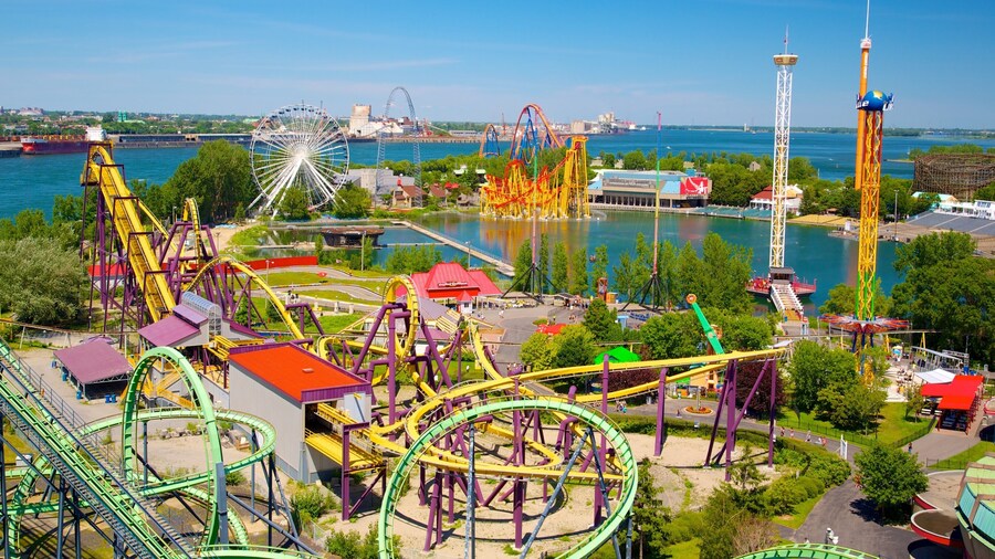 La Ronde Six Flags showing rides, a bay or harbor and a city