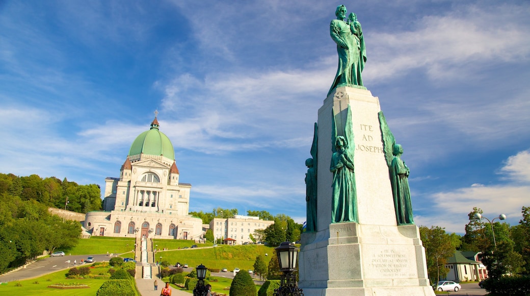Saint Joseph\'s Oratory featuring a statue or sculpture, a city and heritage architecture