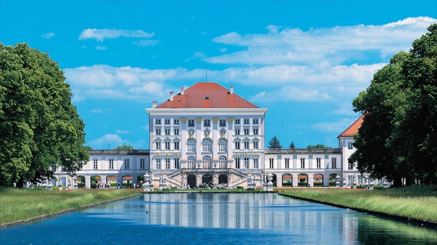 Nymphenburg Palace featuring a castle and a pond