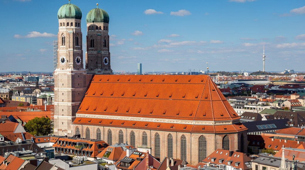 Church of Our Lady showing heritage architecture, landscape views and a city