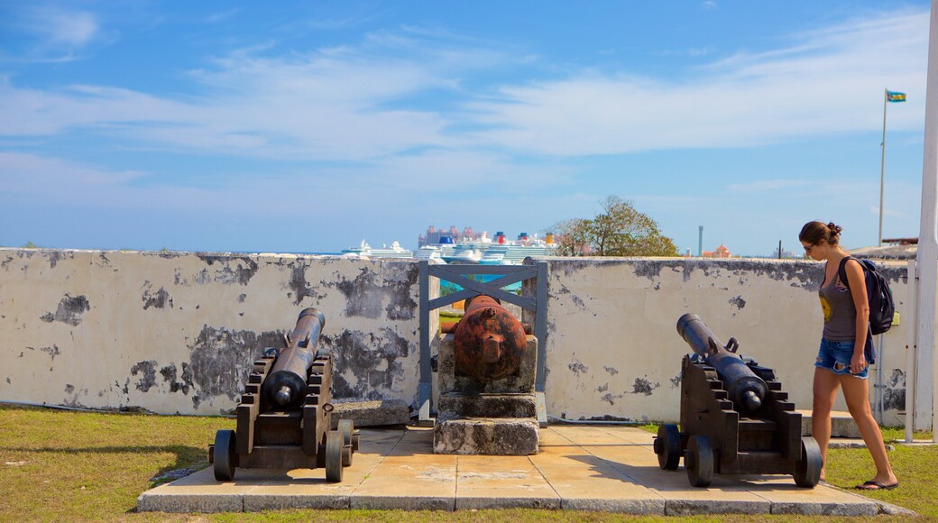 Fort Charlotte featuring heritage elements as well as an individual femail