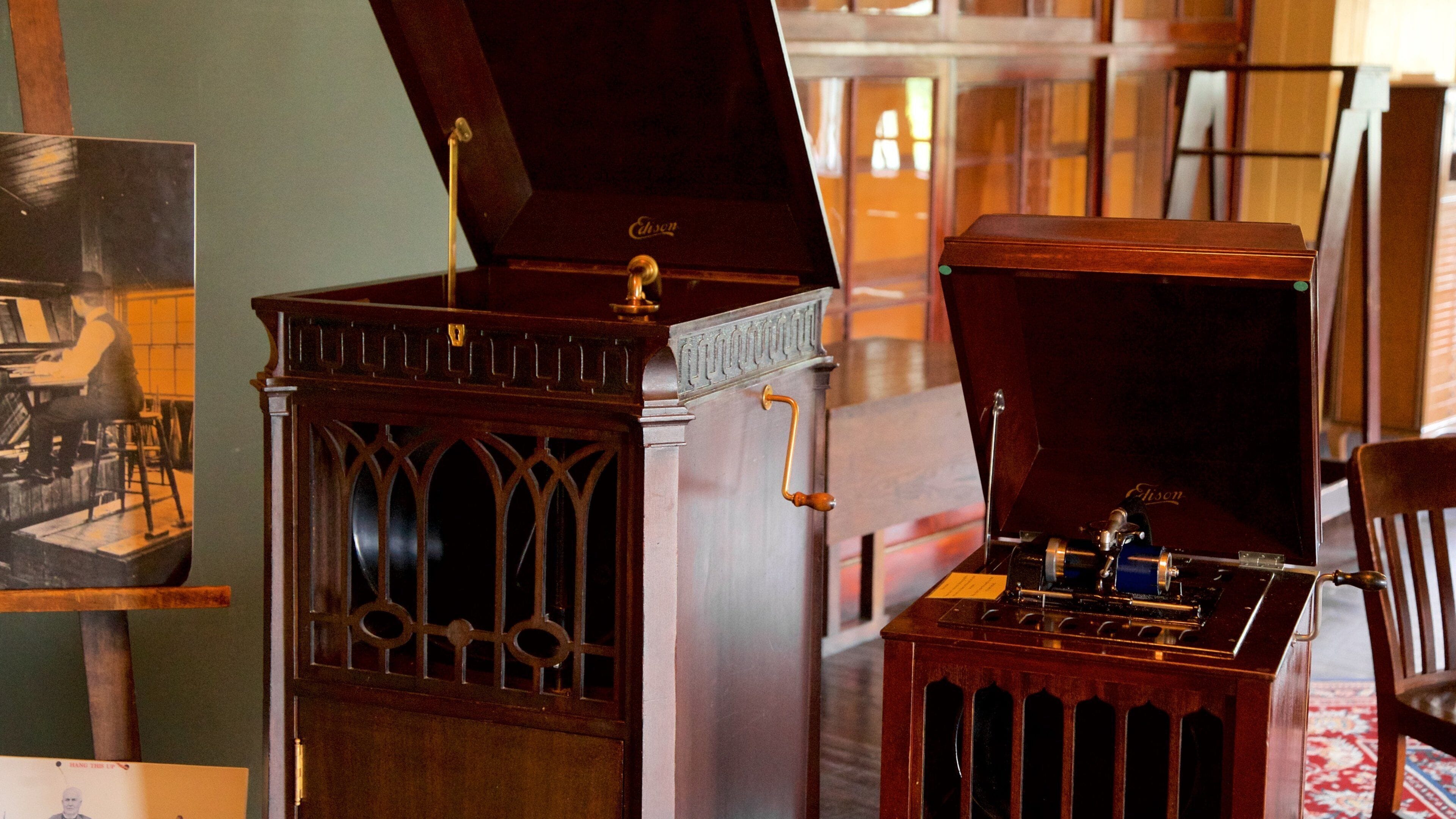 An antique radio with a wooden cabinet and a tuning dial.