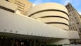 The Solomon R Guggenheim Museum with a unique curved facade and a large circular structure.