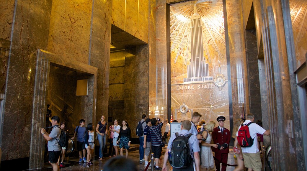 Empire State Building showing interior views as well as a large group of people