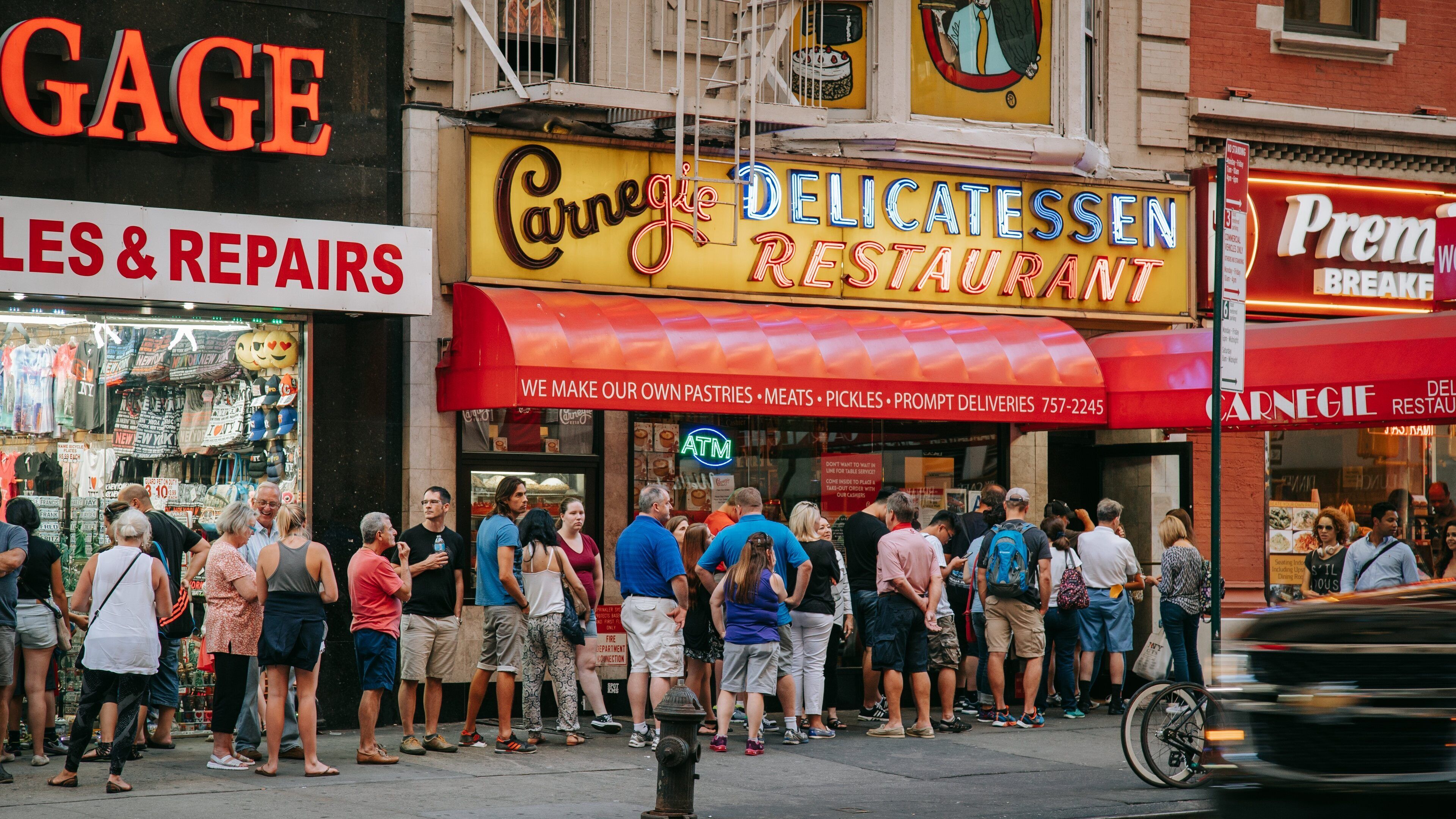 Carnegie Hall showing street scenes and signage