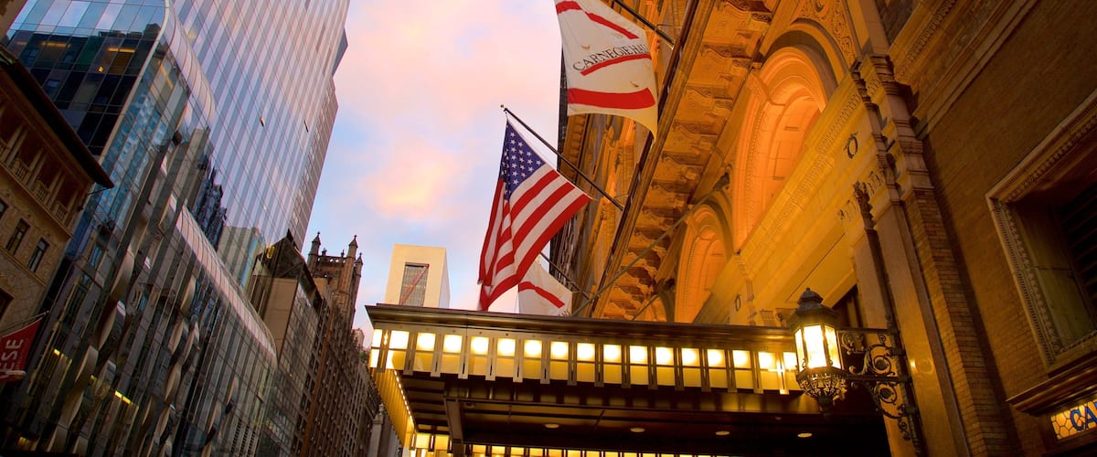 Carnegie Hall which includes a city, a sunset and heritage elements