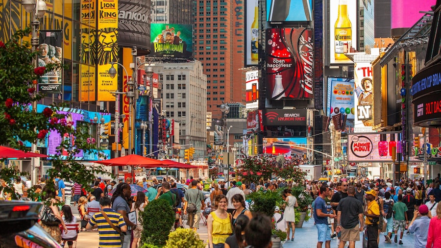 Times Square featuring a city, central business district and signage