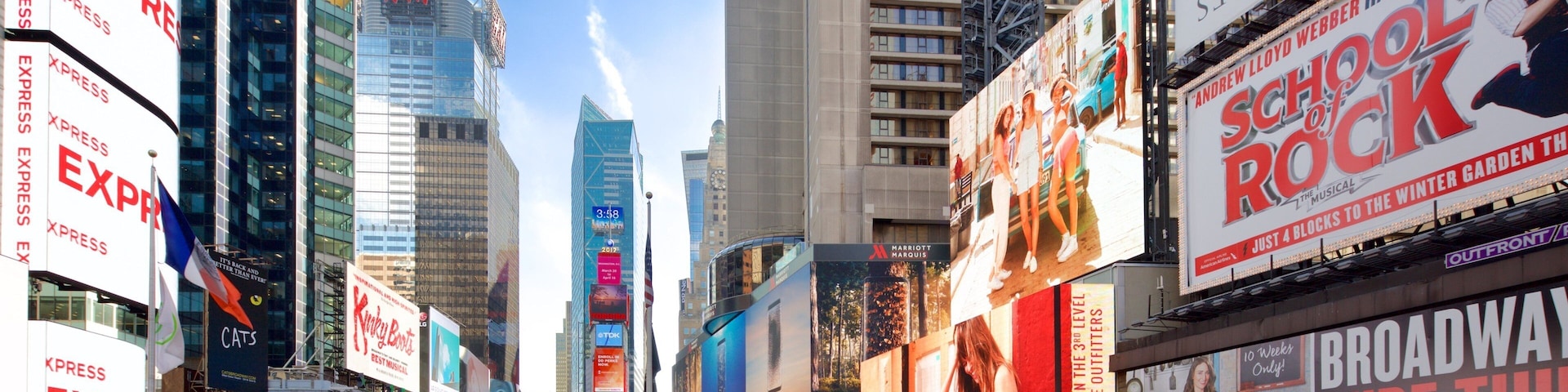 Times Square which includes a city, signage and a high rise building