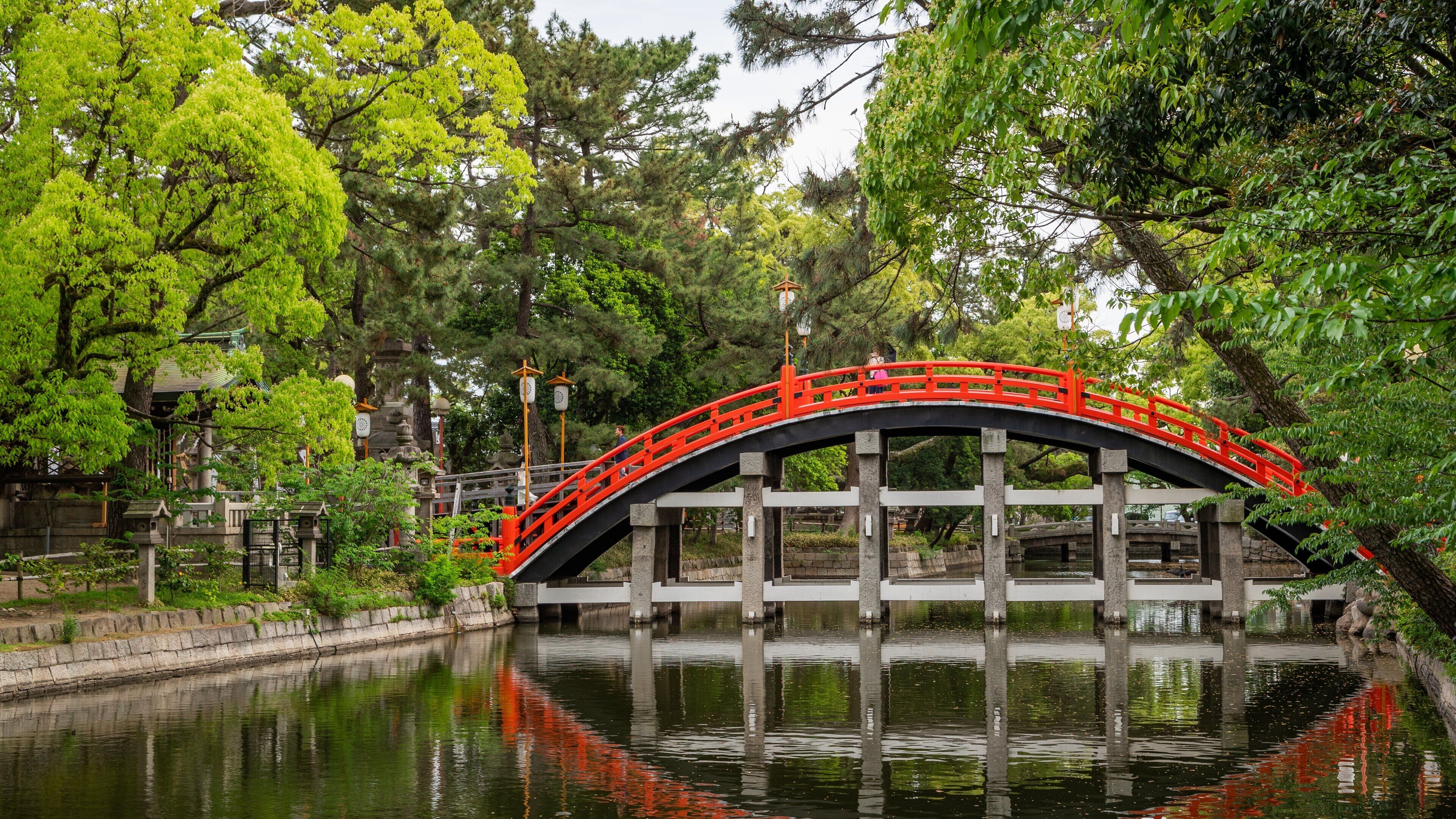 Sumiyoshi Taisha Shrine showing a bridge and a river or creek