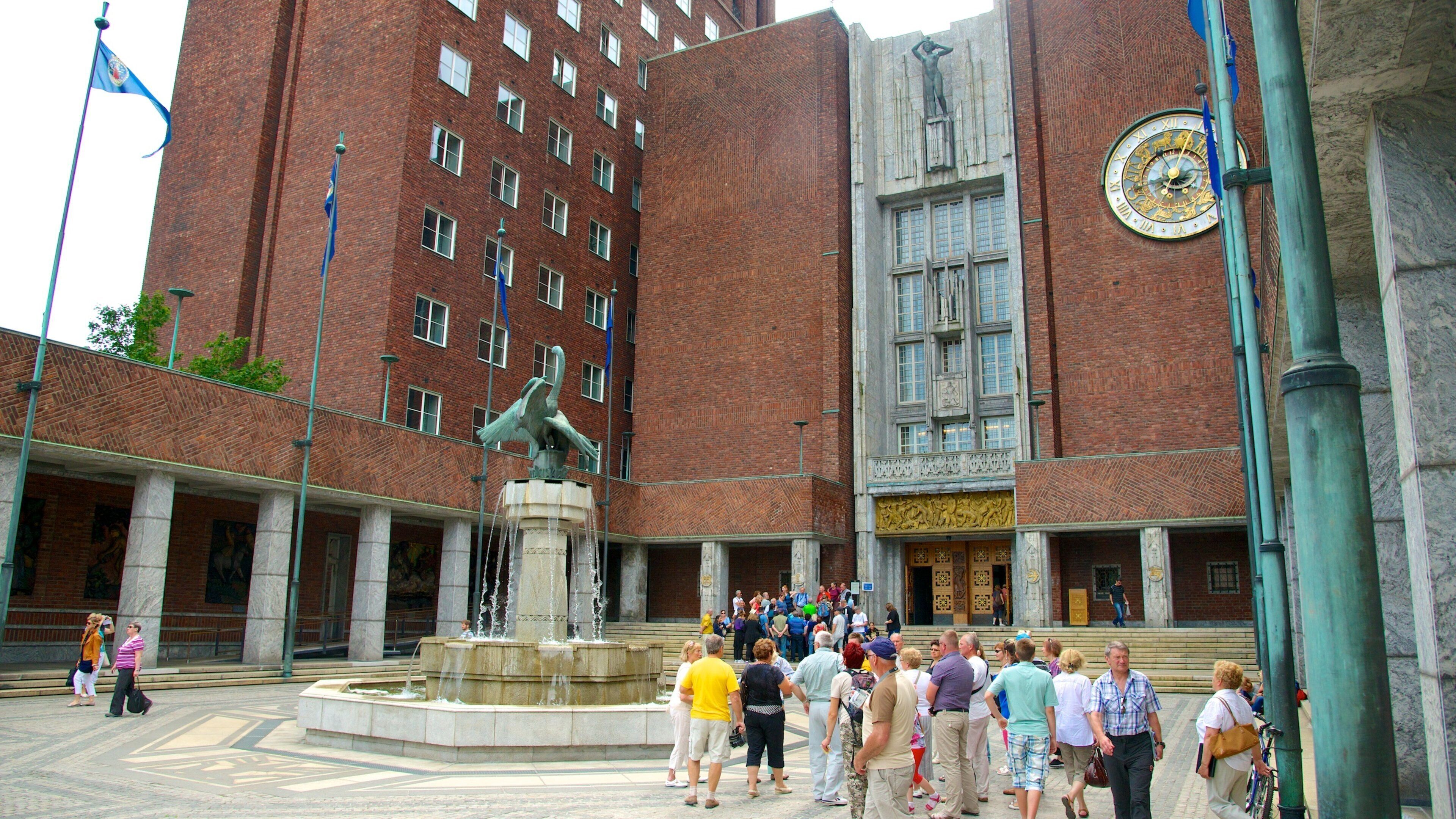 Oslo City Hall which includes a fountain, a square or plaza and an administrative building