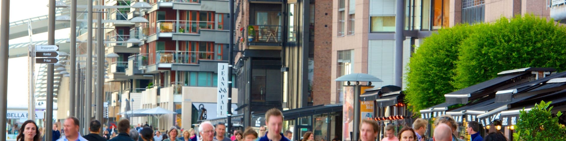 Aker Brygge which includes a city and street scenes as well as a large group of people
