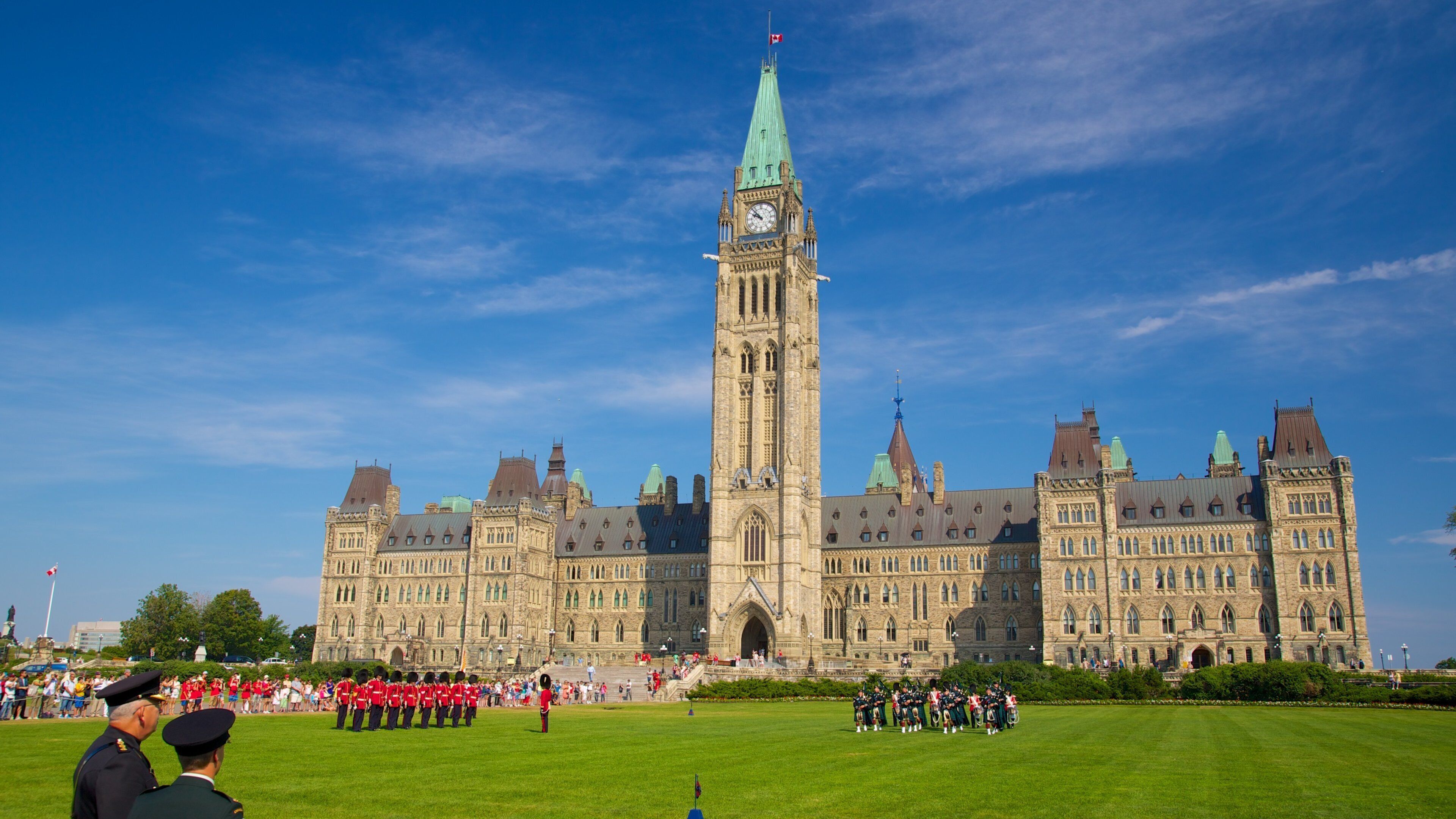 Parliament Hill featuring a garden, heritage architecture and performance art