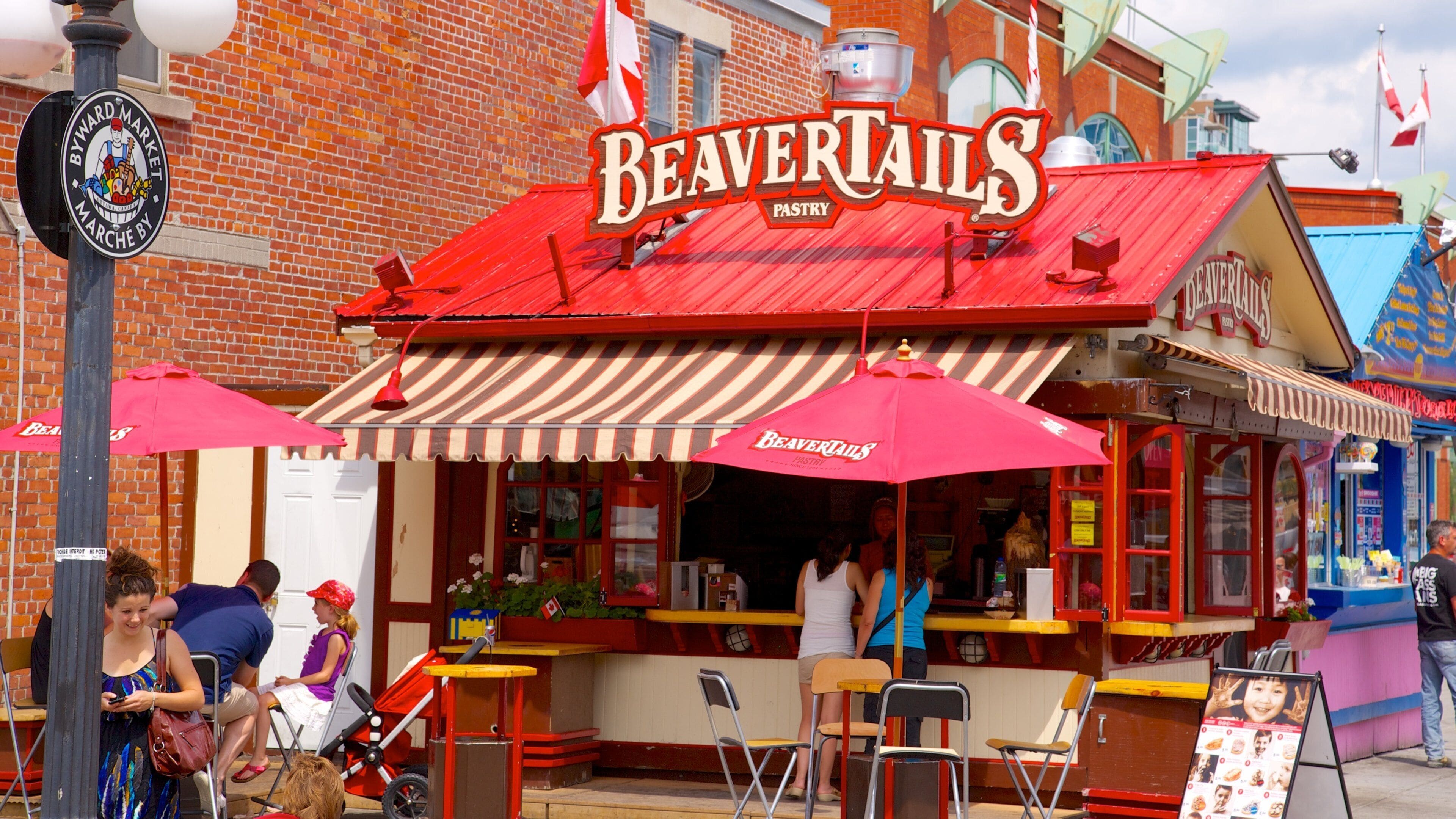 Byward Market showing signage, markets and a city