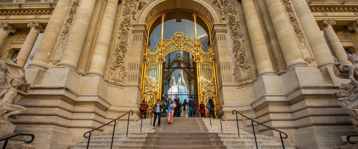 Petit Palais which includes heritage architecture as well as a small group of people