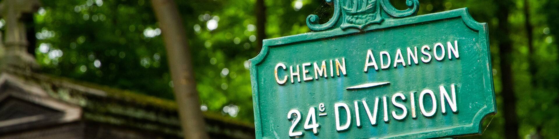 Pere Lachaise Cemetery which includes signage and heritage elements