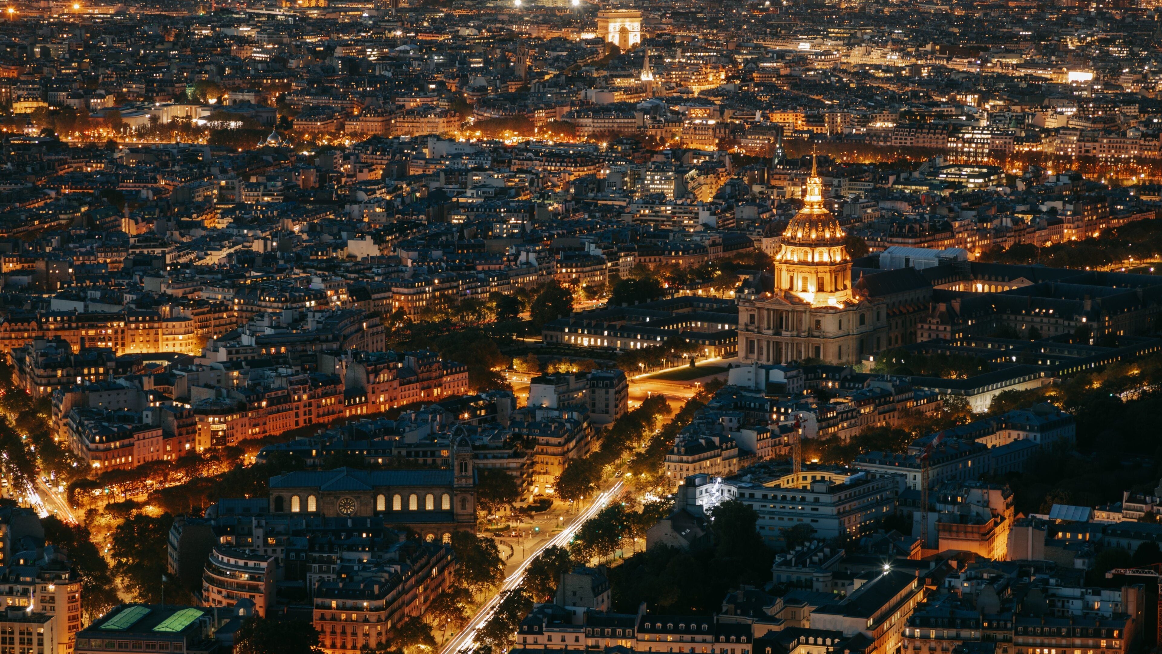 Les Invalides featuring a city, night scenes and landscape views