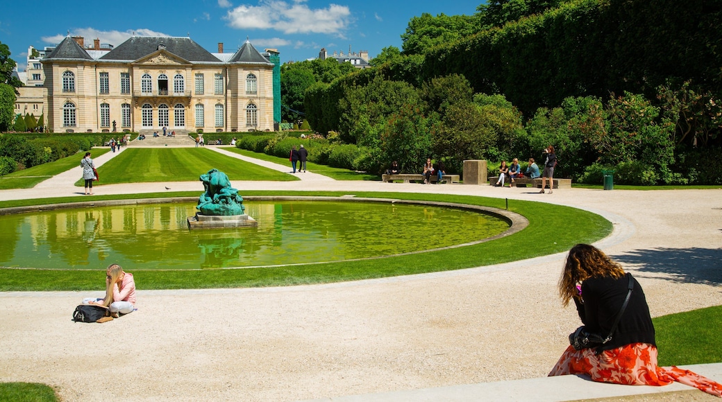 Rodin Museum featuring a garden, heritage architecture and a fountain