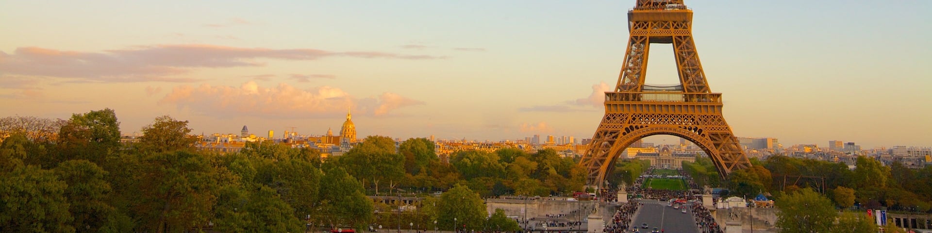 Eiffel Tower showing a sunset, a monument and heritage architecture
